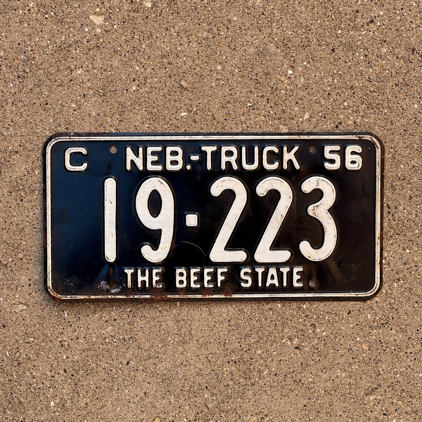 Photo of a 1956 Nebraska Truck License Plate Auto Tag Garage Decor Vintage Beef State 19 223