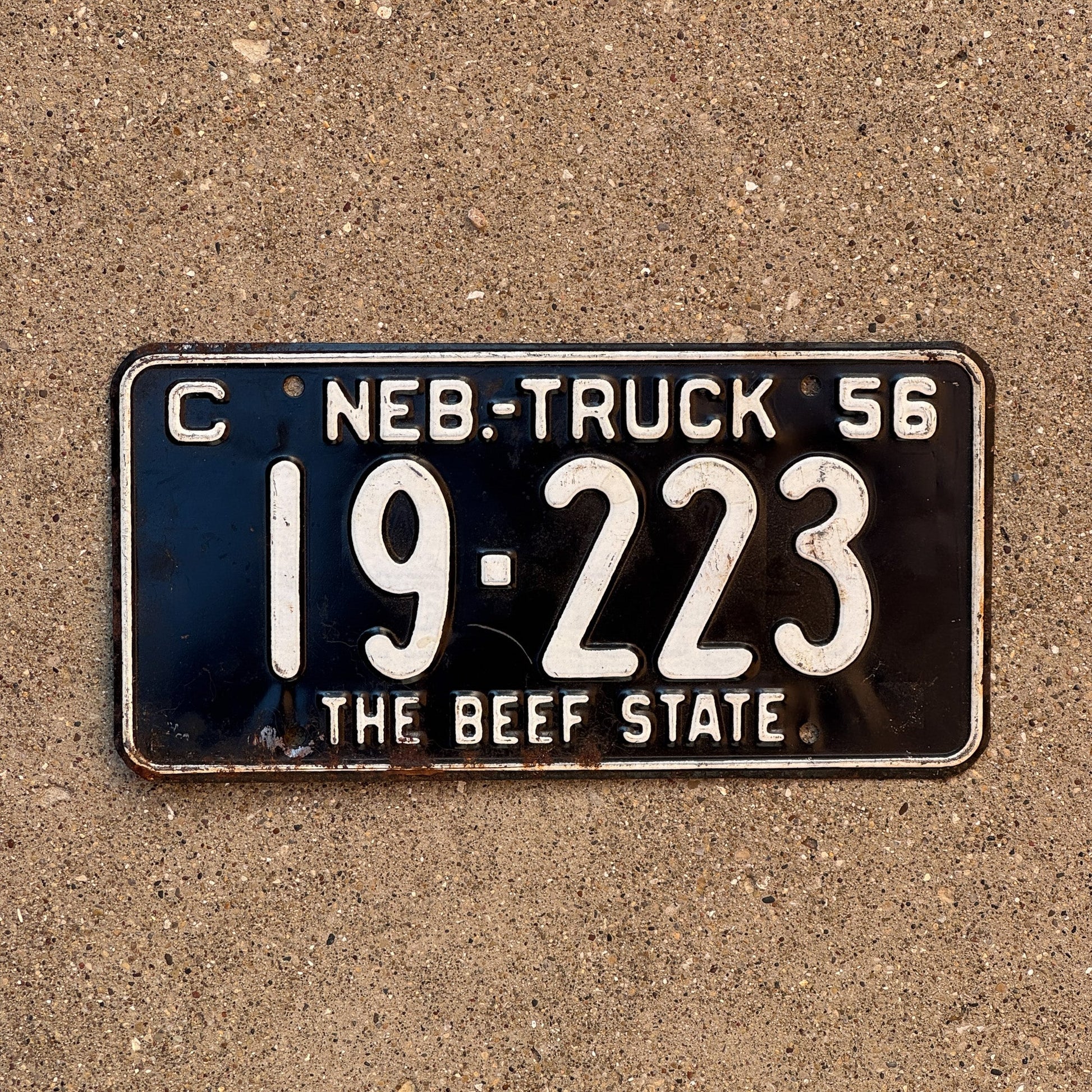 Photo of a 1956 Nebraska Truck License Plate Auto Tag Garage Decor Vintage Beef State 19 223
