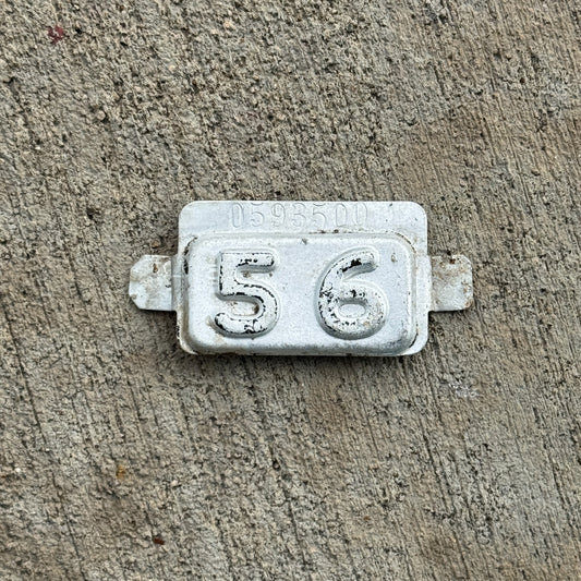 Photo of a 1956 New Jersey Tab License Plate Auto Tag 2 Vintage 0593500 with original patina