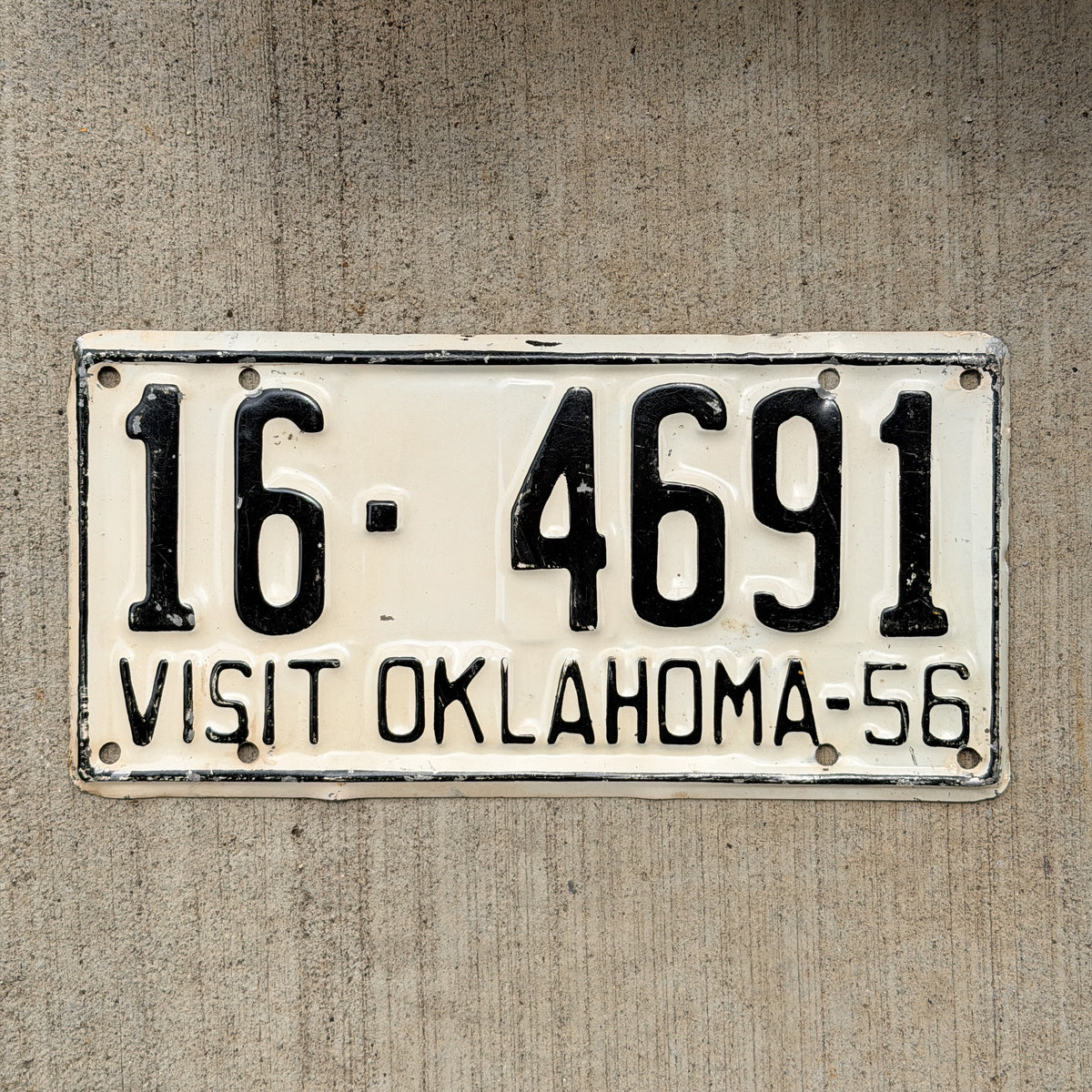 Photo of a 1956 Oklahoma License Plate Auto Tag Garage Decor Vintage 16 4691 with original patina