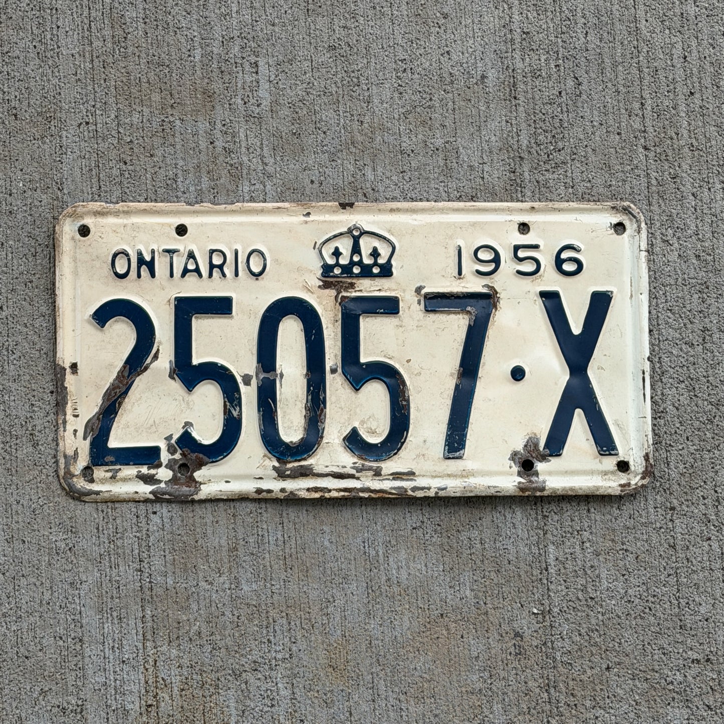 Photo of a 1956 Ontario Dual Purpose Vehicle License Plate Auto Tag Garage Decor Vintage 25057 X with original patina