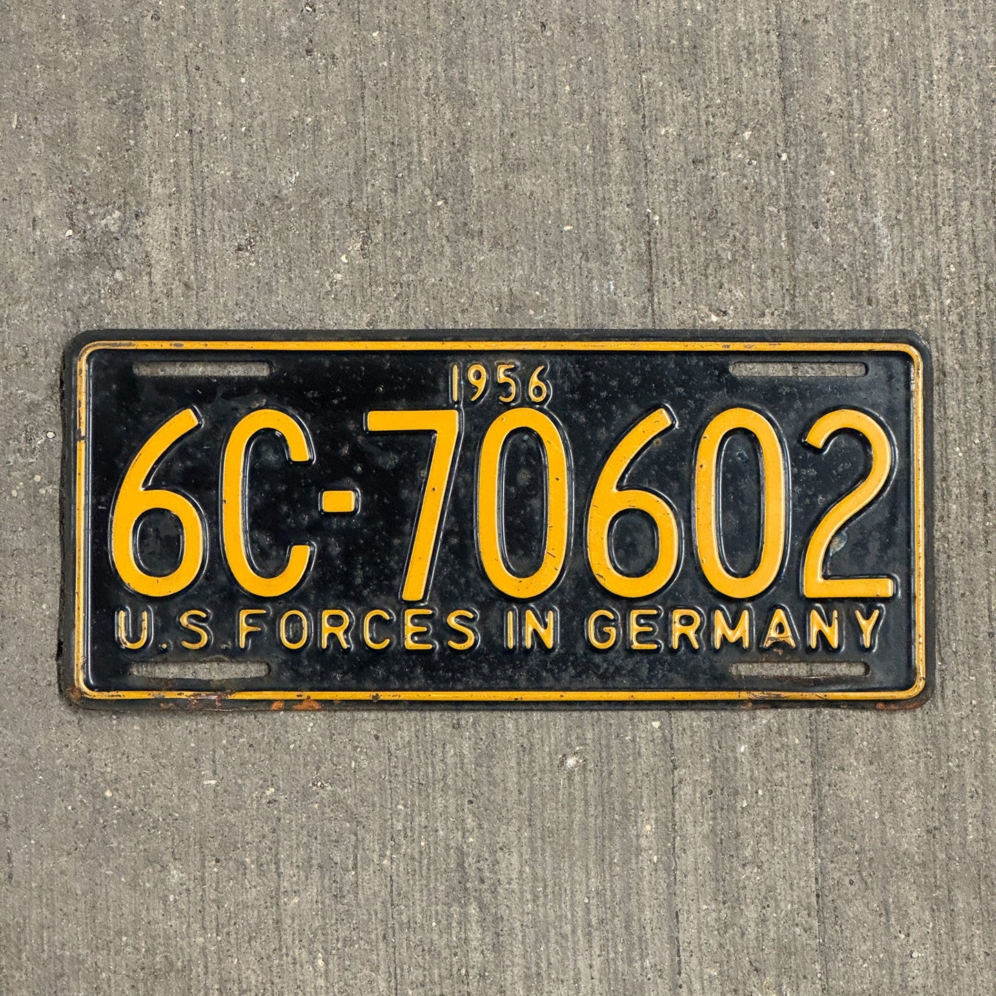 Photo of a 1956 US Forces Germany License Plate Auto Tag Garage Decor Vintage 6C 70602 with original patina