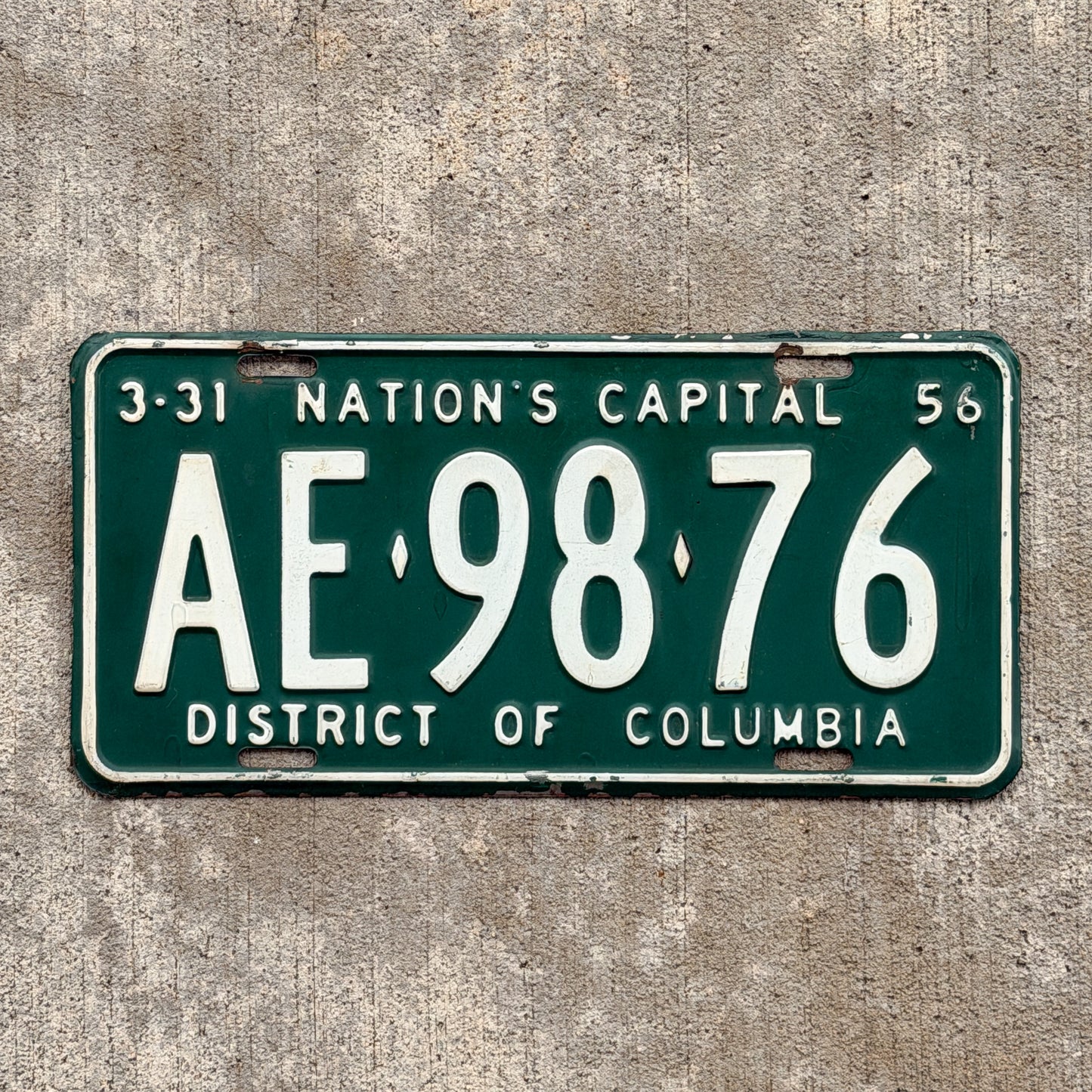 Photo of a 1956 Washington DC License Plate Auto Tag Garage Decor Vintage AE 98 76 with original patina