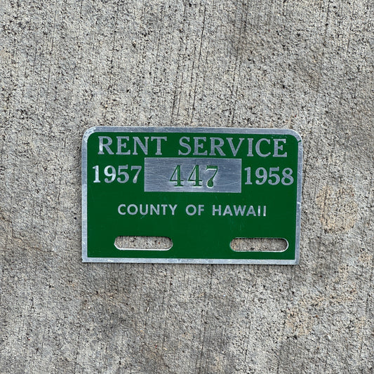 Photo of a 1957 Hawaii Tag Auto Tag Garage Decor Vintage Rent Service 447 with original patina