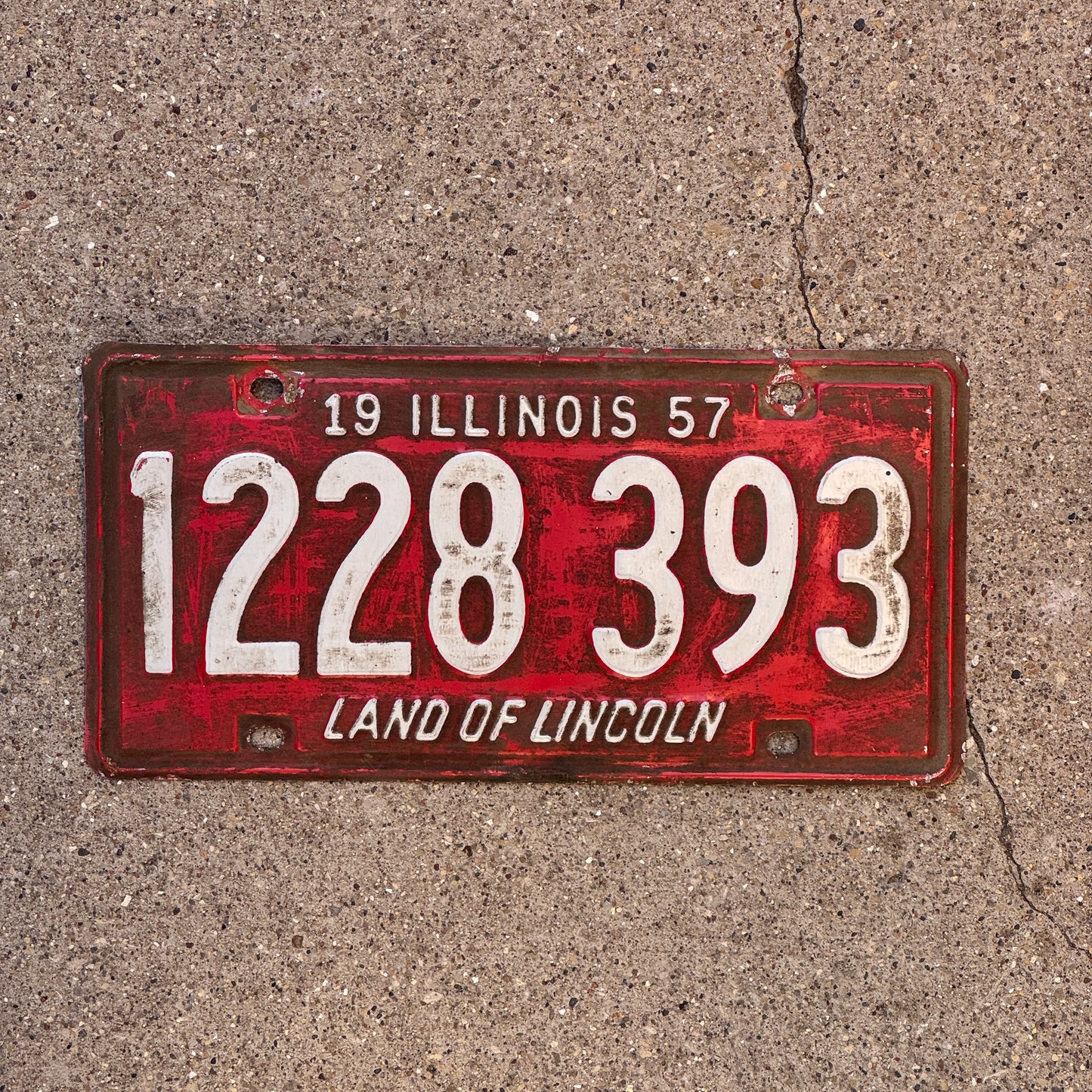 Photo of a 1957 Illinois License Plate Auto Tag 1 Vintage Garage 1 228 393 with original patina