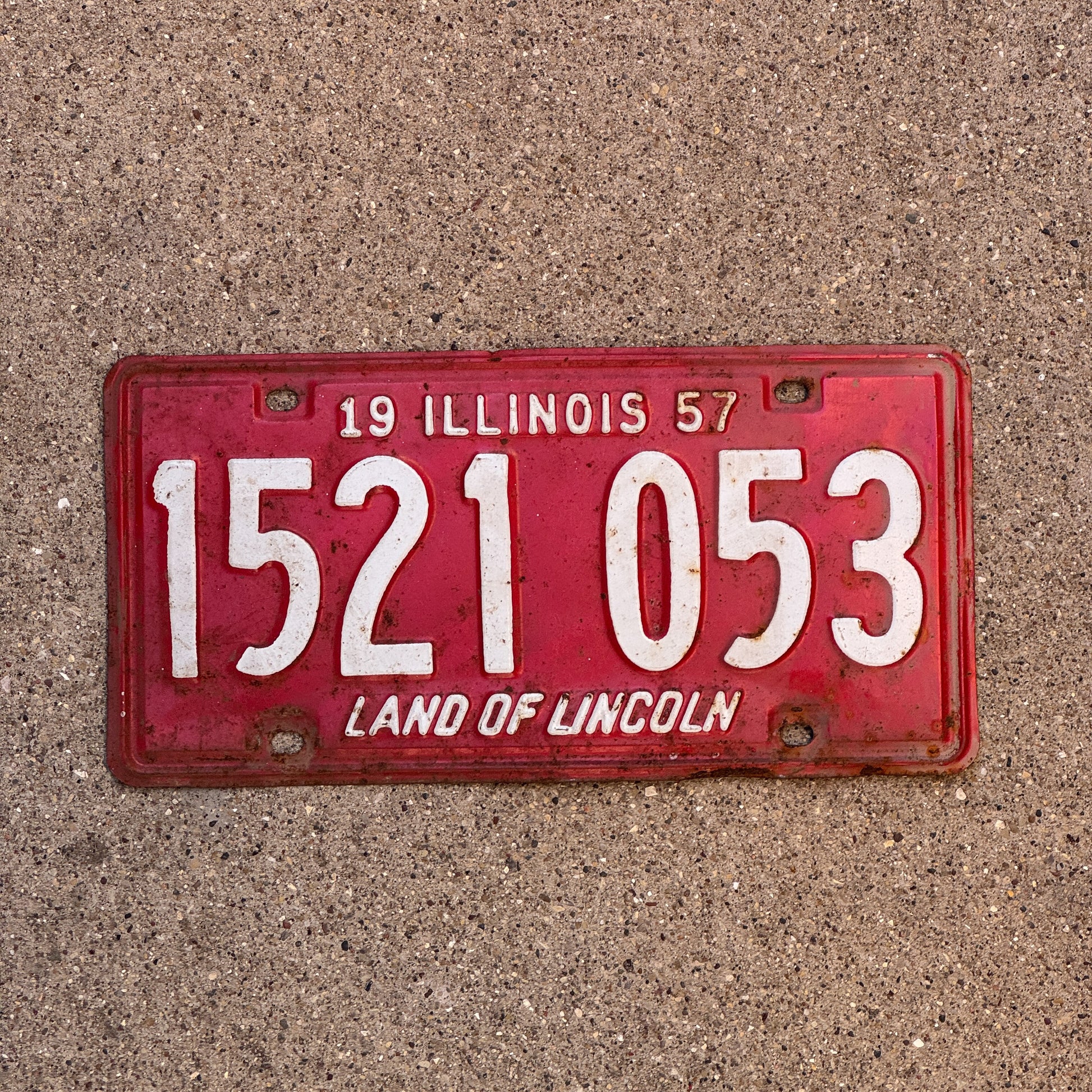 Photo of a 1957 Illinois License Plate Auto Tag 1 Vintage Garage 1 521 053 with original patina