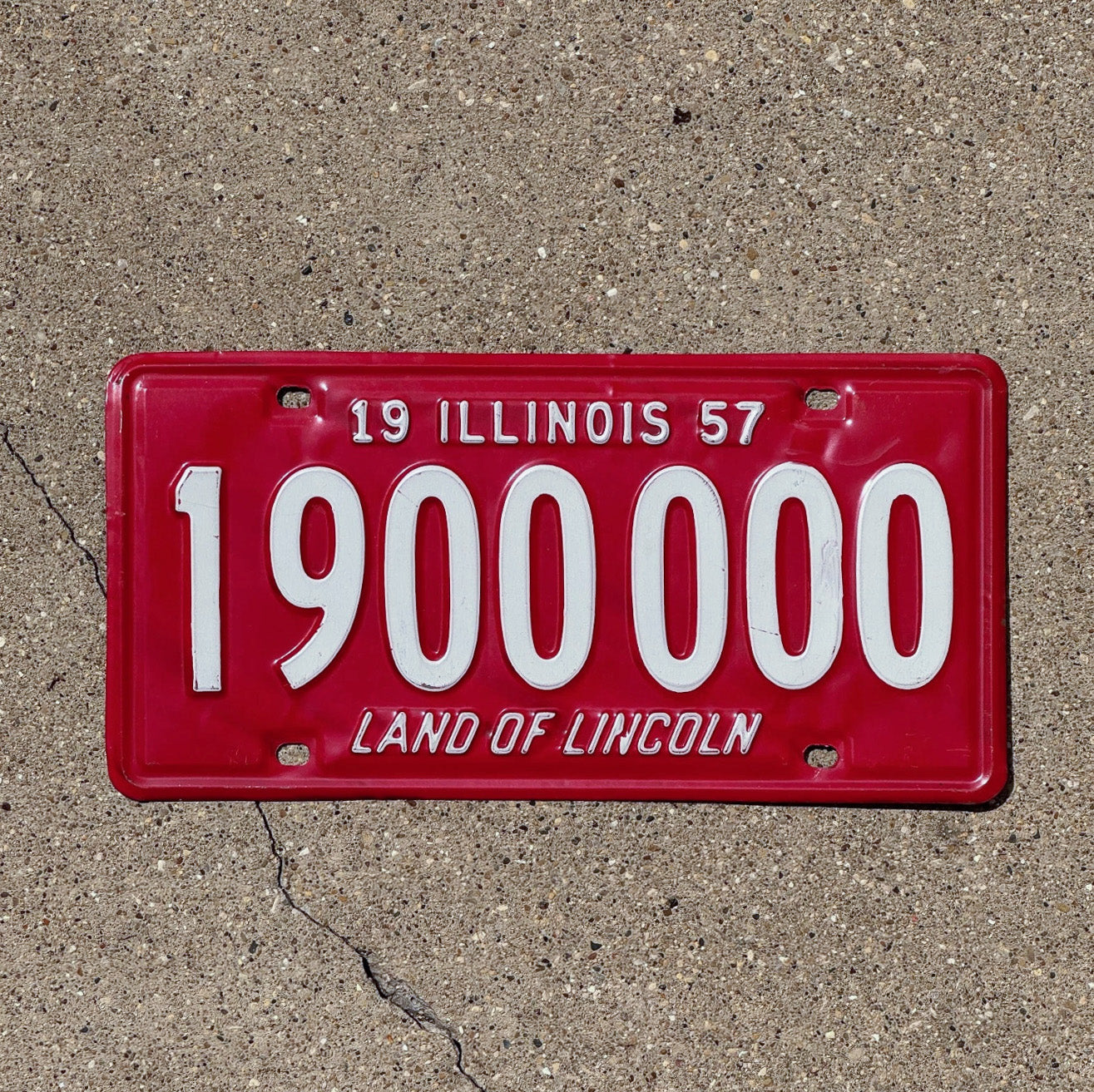 Photo of a 1957 Illinois License Plate Auto Tag 1 Vintage Garage Great Number 1900000 with original patina