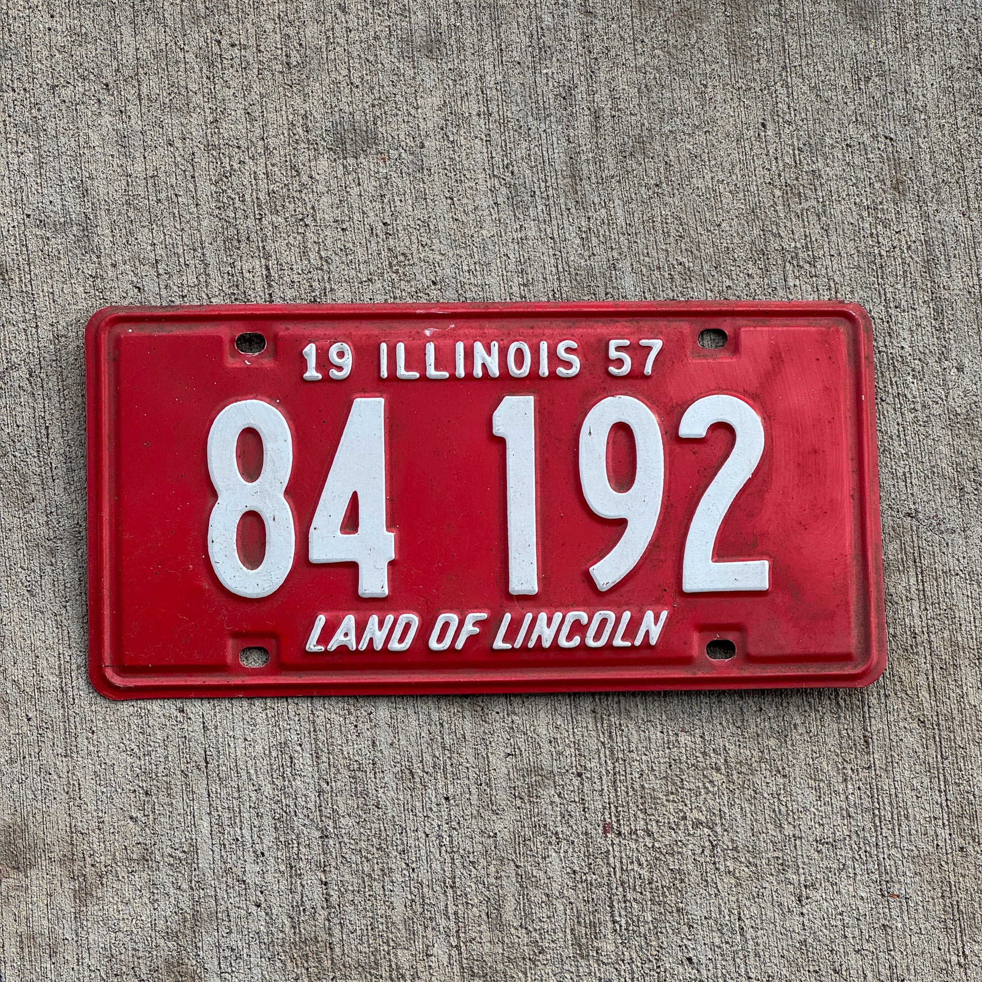 Photo of a 1957 Illinois License Plate Auto Tag Garage Decor Vintage 84 192 with original patina