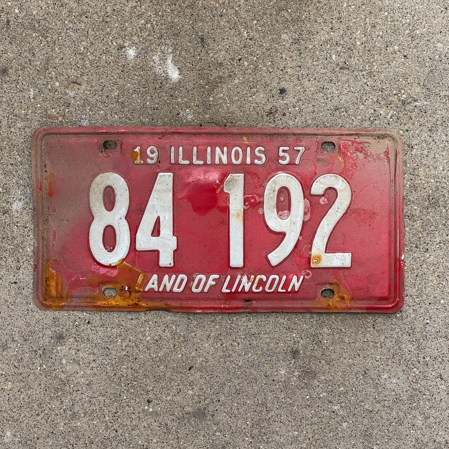 Photo of a 1957 Illinois License Plate Auto Tag Garage Decor Vintage 84 192 with original patina