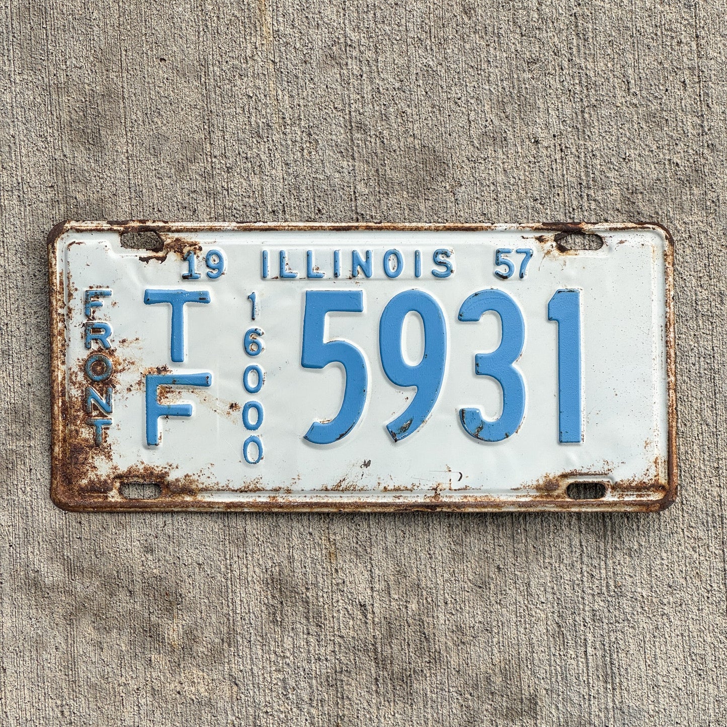 Photo of a 1957 Illinois Truck Mileage Tax License Plate Auto Tag Garage Decor Vintage 16000 LBS TF 5931 with original patina