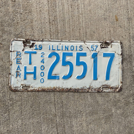 Photo of a 1957 Illinois Truck Mileage Tax License Plate Auto Tag Garage Decor Vintage Rear TH 25517 with original patina