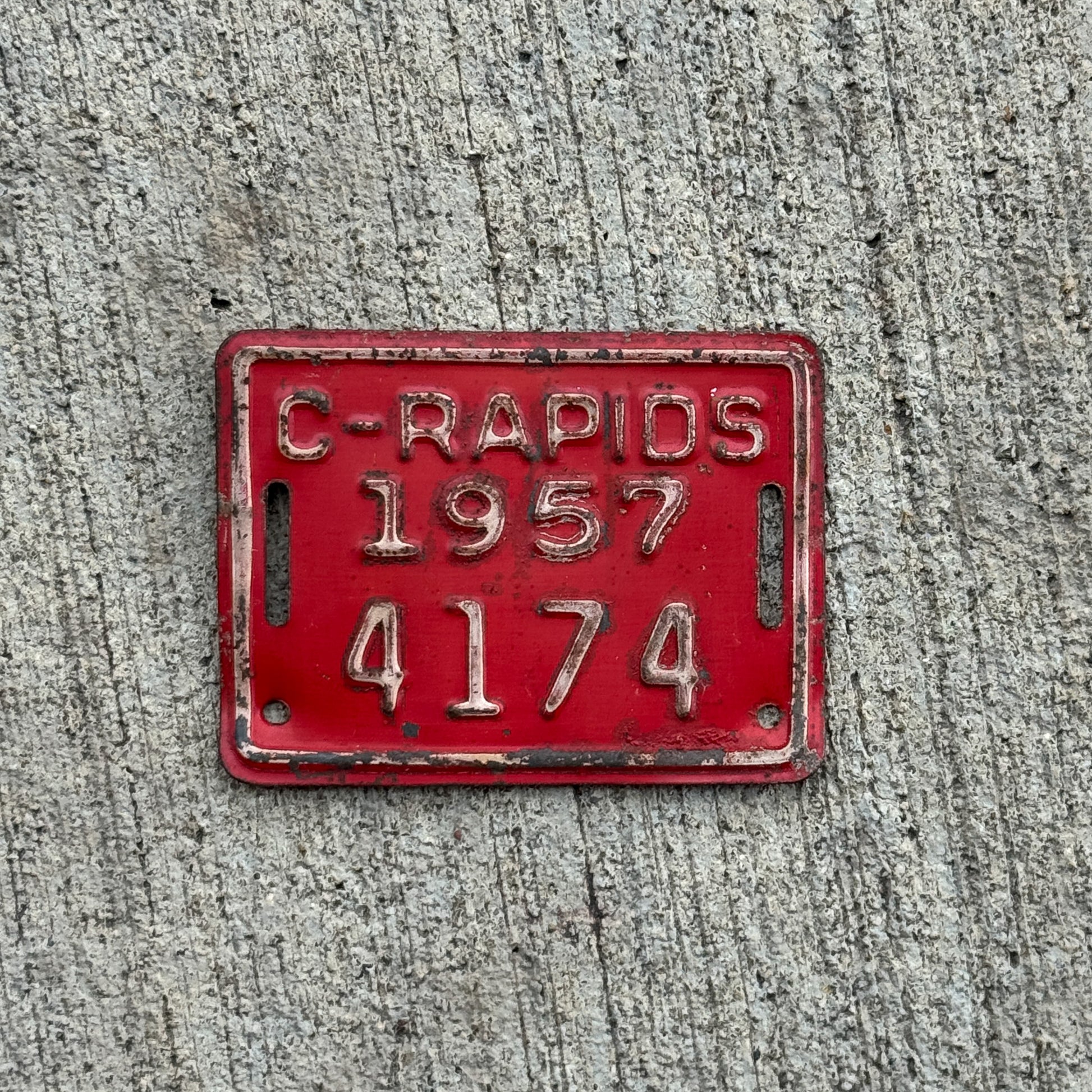 Photo of a 1957 Iowa Bicycle License Plate Auto Tag Garage Decor Vintage Bike 4174 with original patina