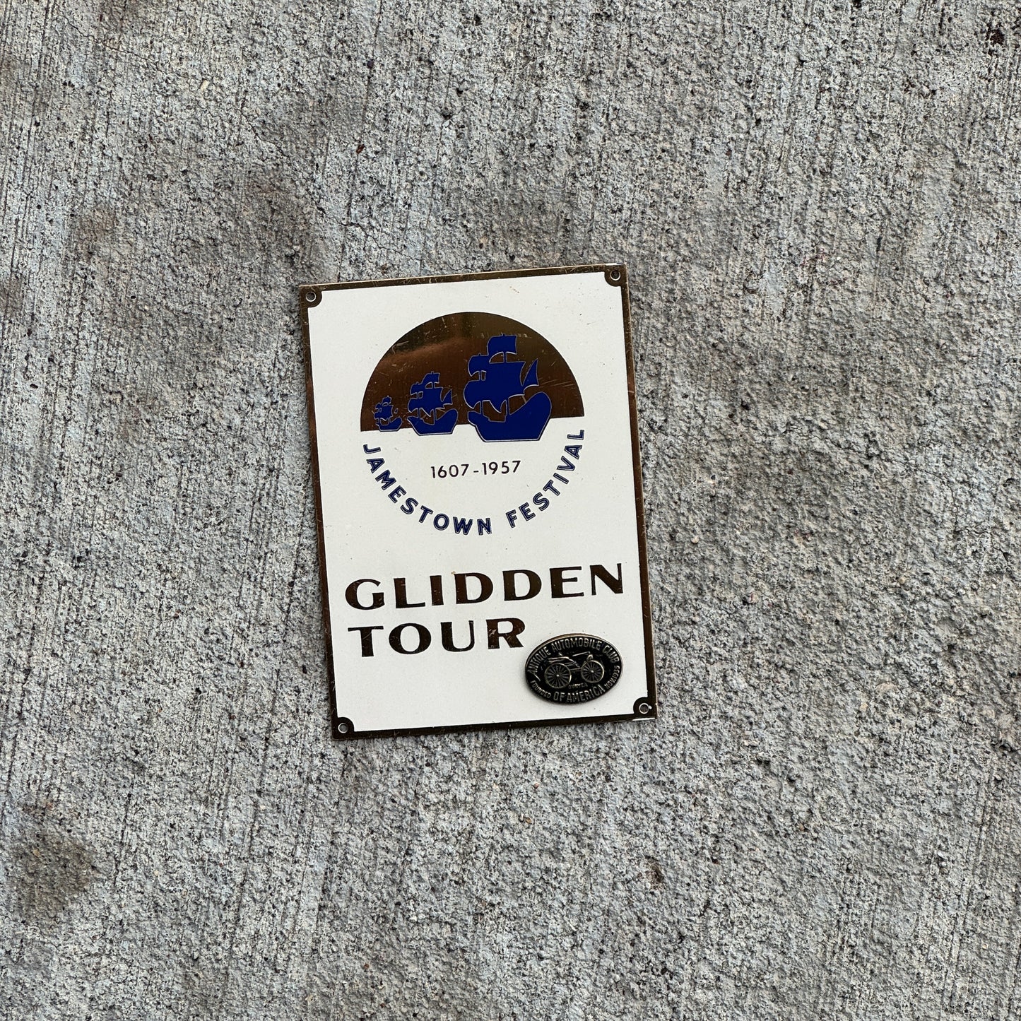 Photo of a 1957 Jamestown Glidden Tour Virginia Dash Plaque Auto Tag Garage Decor Vintage AACA with original patina