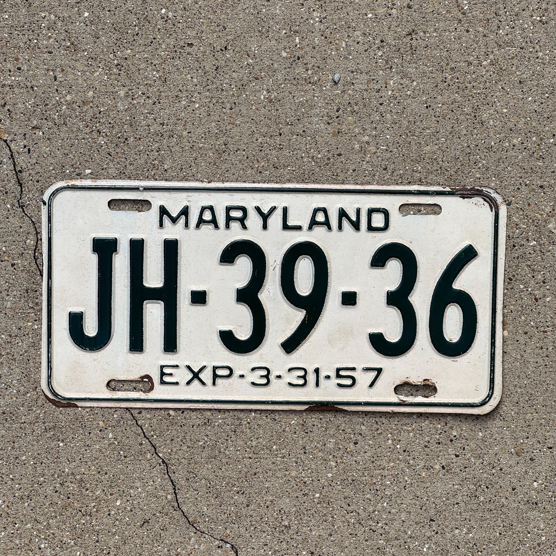 Photo of a 1957 Maryland License Plate Auto Tag Garage Decor Vintage JH 3936