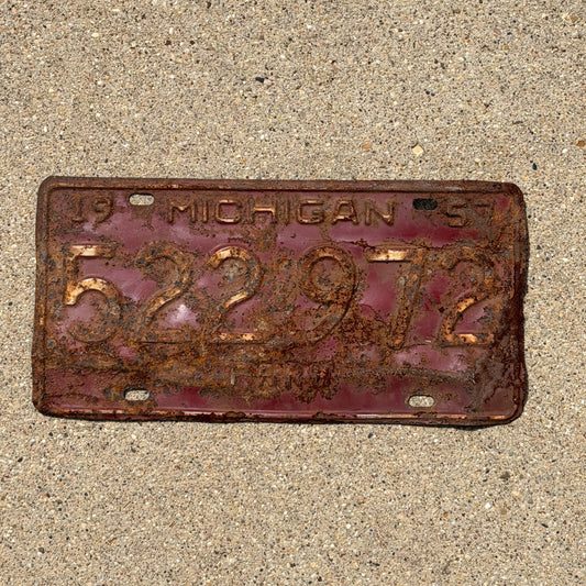 Photo of a 1957 Michigan Farm License Plate Auto Tag Garage Decor Vintage 522 972 with original patina