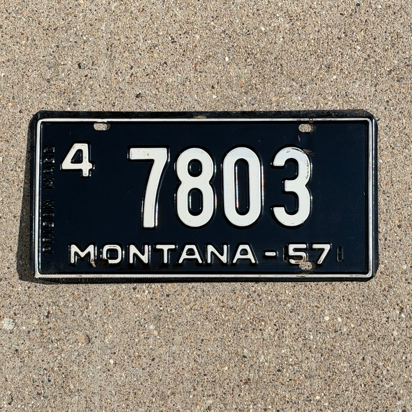 Photo of a 1957 Montana License Plate Auto Tag Garage Decor Vintage 4 7803 with original patina