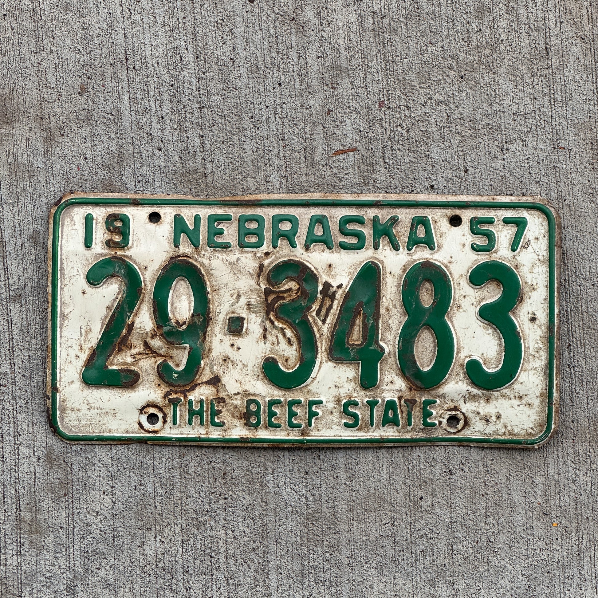 Photo of a 1957 Nebraska License Plate Auto Tag Garage Decor Vintage Beef State 29 3483 with original patina