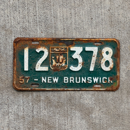 Photo of a 1957 New Brunswick License Plate Auto Tag 1 Vintage Garage Provincial Coat of Arms 12 378 with original patina