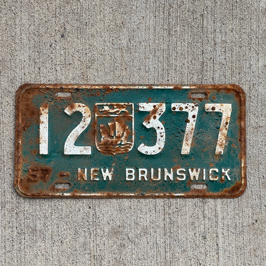 Photo of a 1957 New Brunswick License Plate Auto Tag 2 Vintage Garage Provincial Coat of Arms 12 377 with original patina