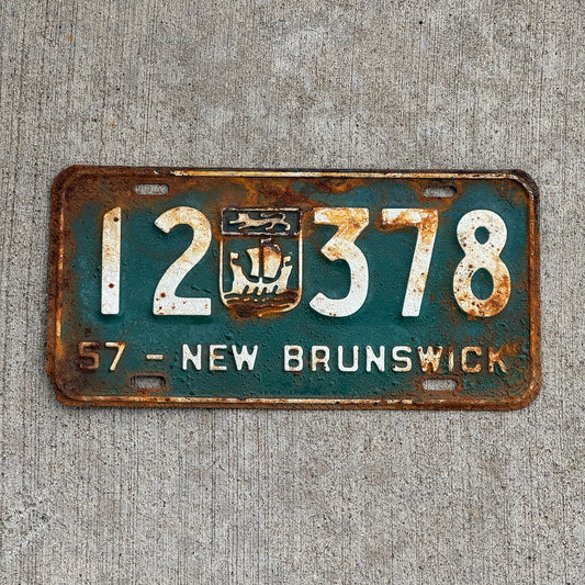 Photo of a 1957 New Brunswick License Plate Auto Tag 2 Vintage Garage Provincial Coat of Arms 12 378 with original patina