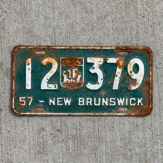 Photo of a 1957 New Brunswick License Plate Auto Tag 2 Vintage Garage Provincial Coat of Arms 12 379 with original patina