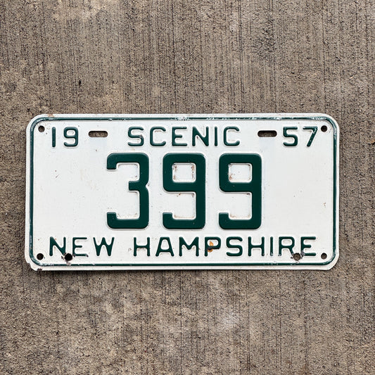 Photo of a 1957 New Hampshire License Plate Auto Tag Garage Decor Vintage Low Number Three Digit 399 with original patina
