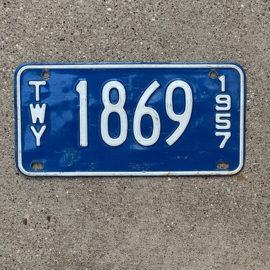 Photo of a 1957 New York TWY Thruway License Plate Auto Tag Garage Decor Vintage Toll Tax 1869