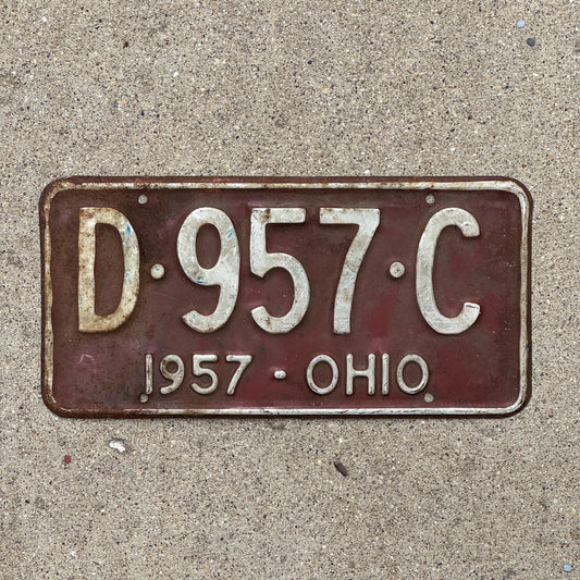 Photo of a 1957 Ohio License Plate Auto Tag Garage Decor Vintage D 957 C with original patina