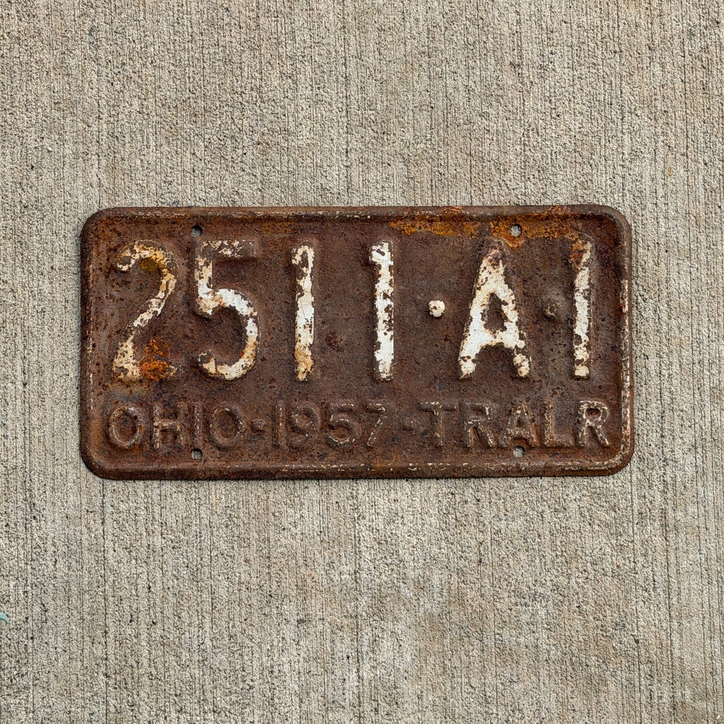 Photo of a 1957 Ohio Trailer License Plate Auto Tag Garage Decor Vintage 2511 A 1 with original patina
