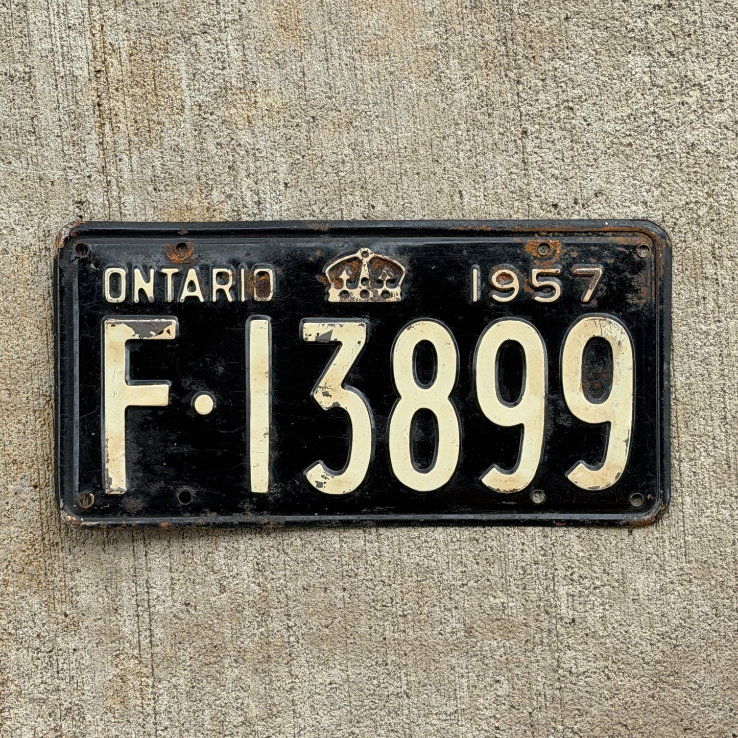 Photo of a 1957 Ontario License Plate Auto Tag Garage Decor Vintage F 13899 with original patina