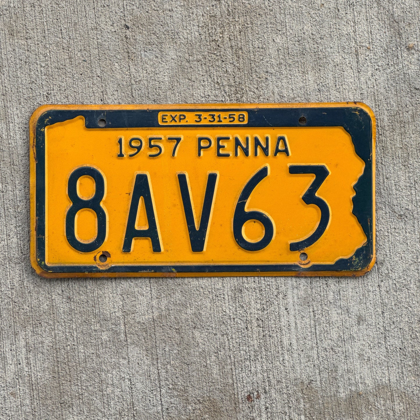 Photo of a 1957 Pennsylvania License Plate Auto Tag Garage Decor Vintage 8 AV 63 with original patina
