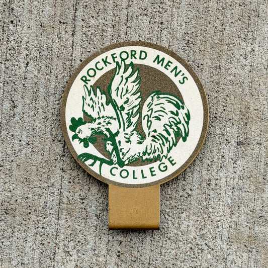 Photo of a 1957 Rockford Men's College Illinois License Plate Topper Auto Tag Garage Decor Vintage Banty Bantam Mascot Smaltz Reflective Paint with original patina