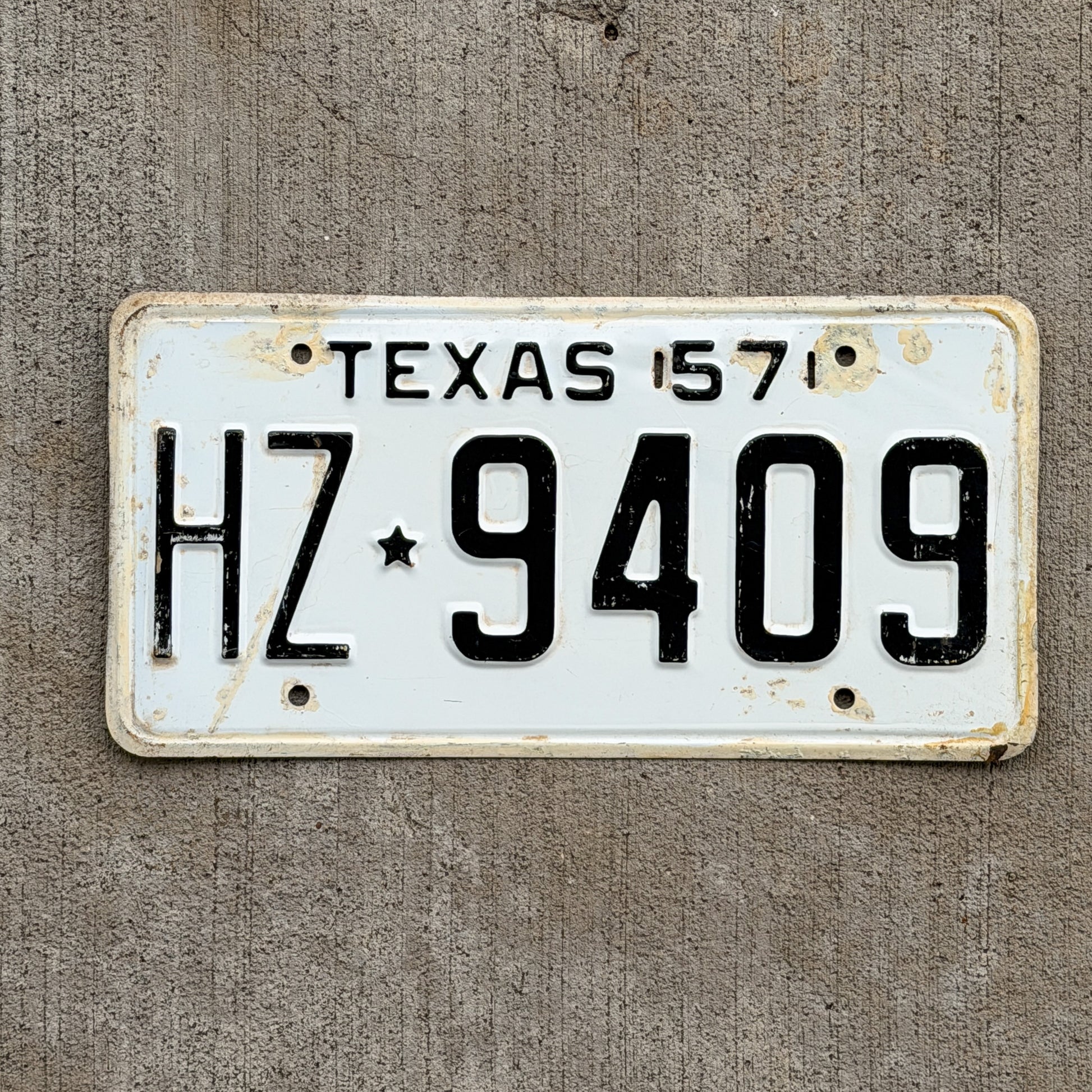 Photo of a 1957 Texas License Plate Auto Tag Garage Decor Vintage HZ 9409 with original patina