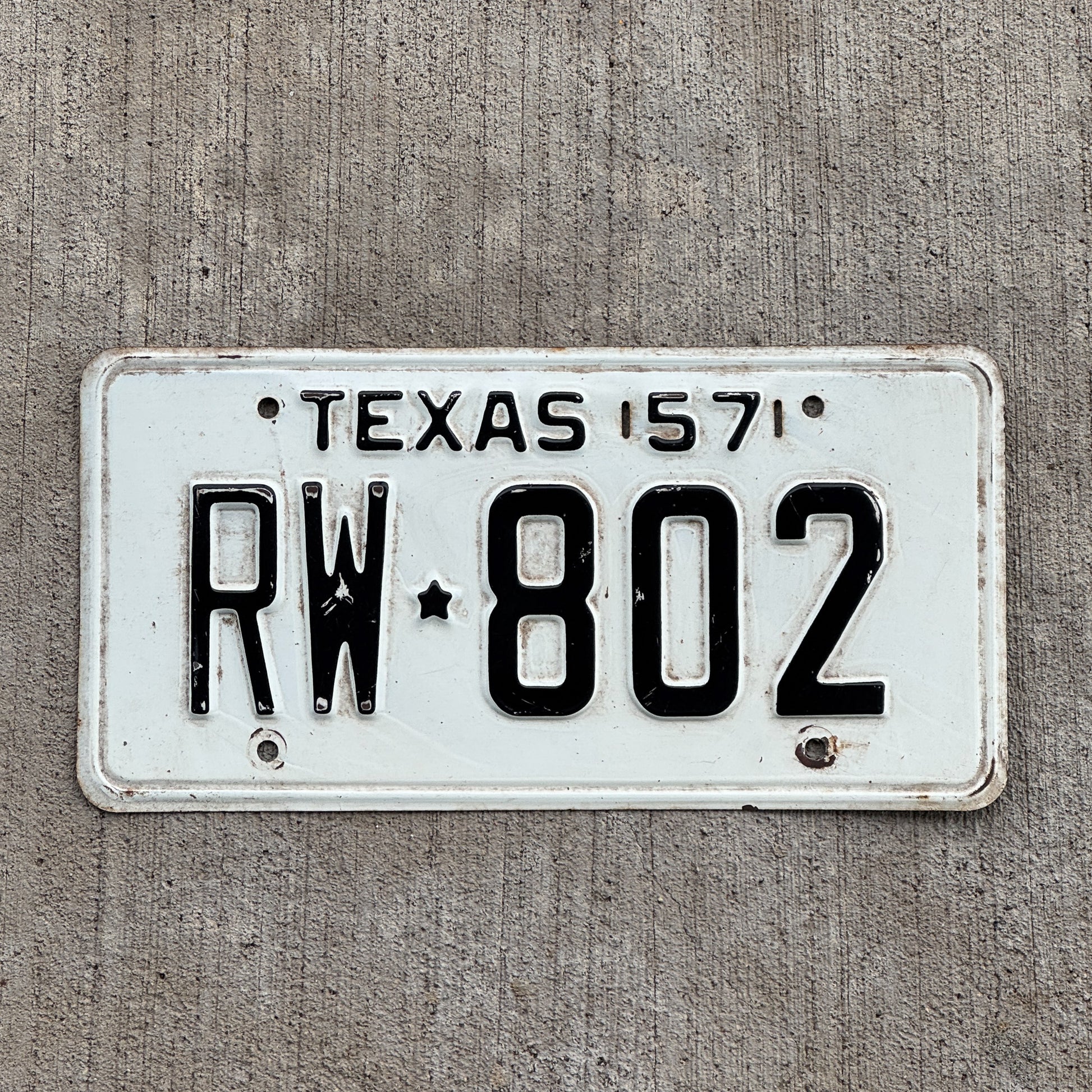 Photo of a 1957 Texas License Plate Auto Tag Garage Decor Vintage RW 802 with original patina