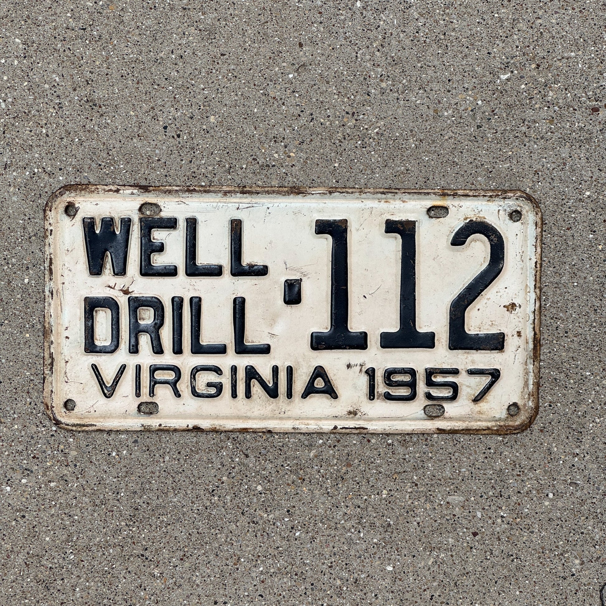 Photo of a 1957 Virginia Well Drill License Plate Auto Tag Garage Decor Vintage 112