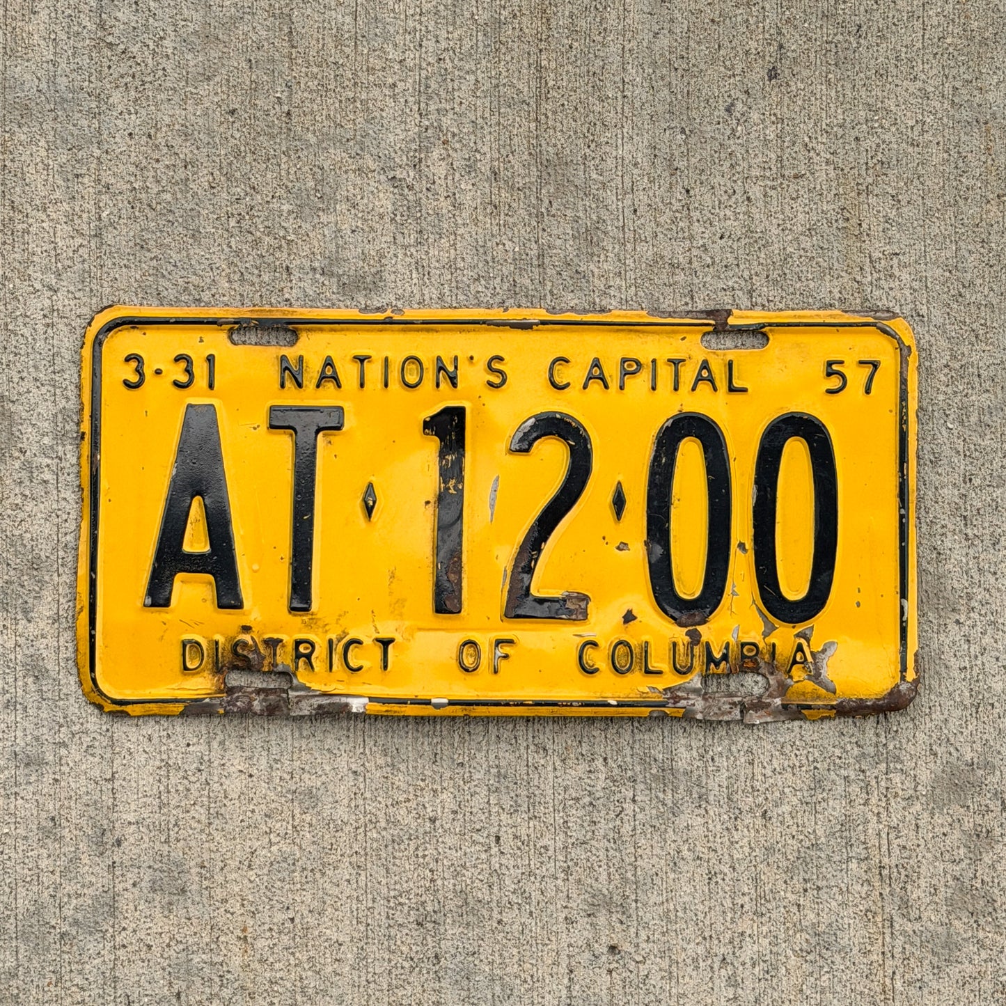 Photo of a 1957 Washington DC License Plate Auto Tag 2 Vintage Garage AT 12 00 with original patina