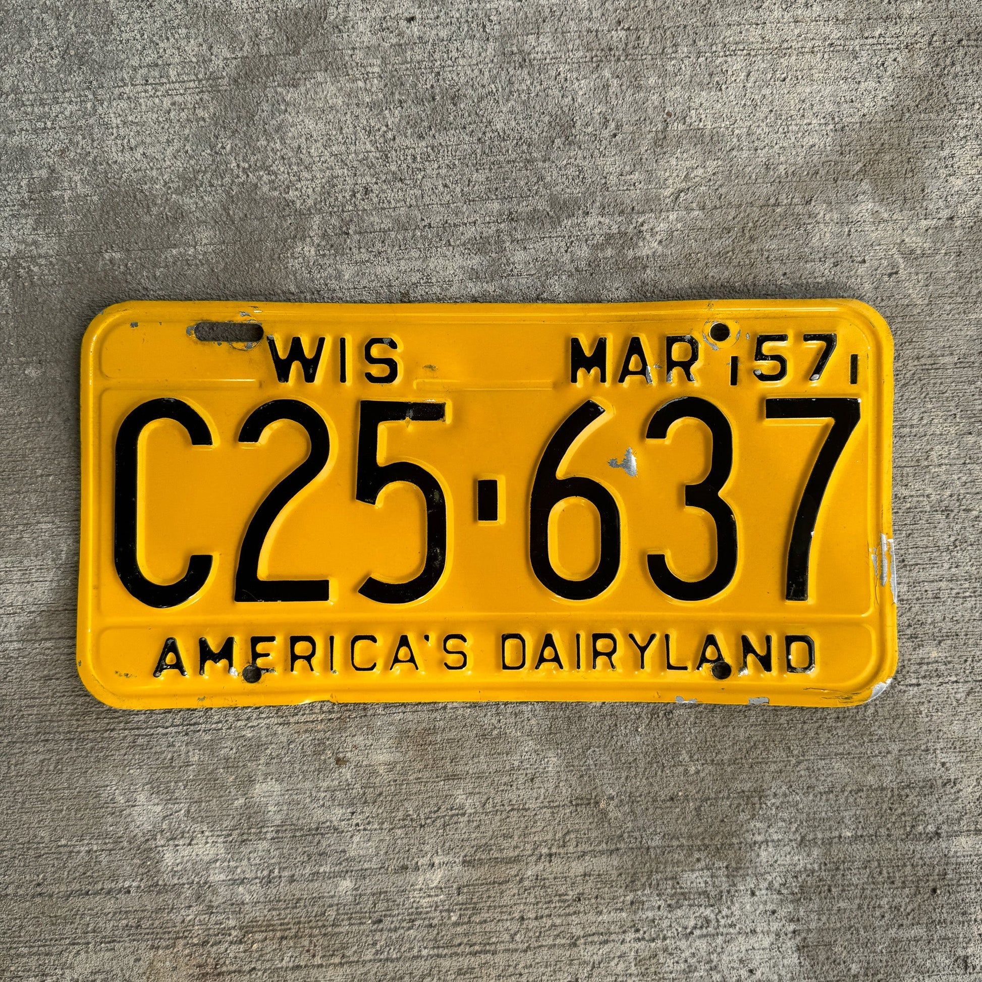 Photo of a 1957 Wisconsin License Plate Auto Tag Garage Decor Vintage C25 637 with original patina