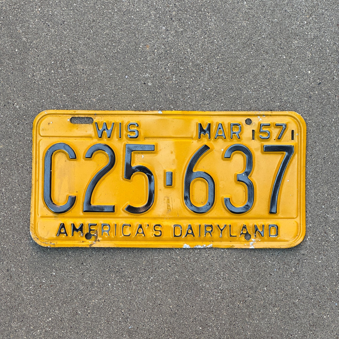 Photo of a 1957 Wisconsin License Plate Auto Tag Garage Decor Vintage C25 637 with original patina