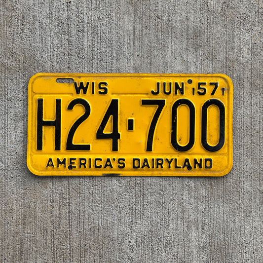 Photo of a 1957 Wisconsin License Plate Auto Tag Garage Decor Vintage H24 700 with original patina