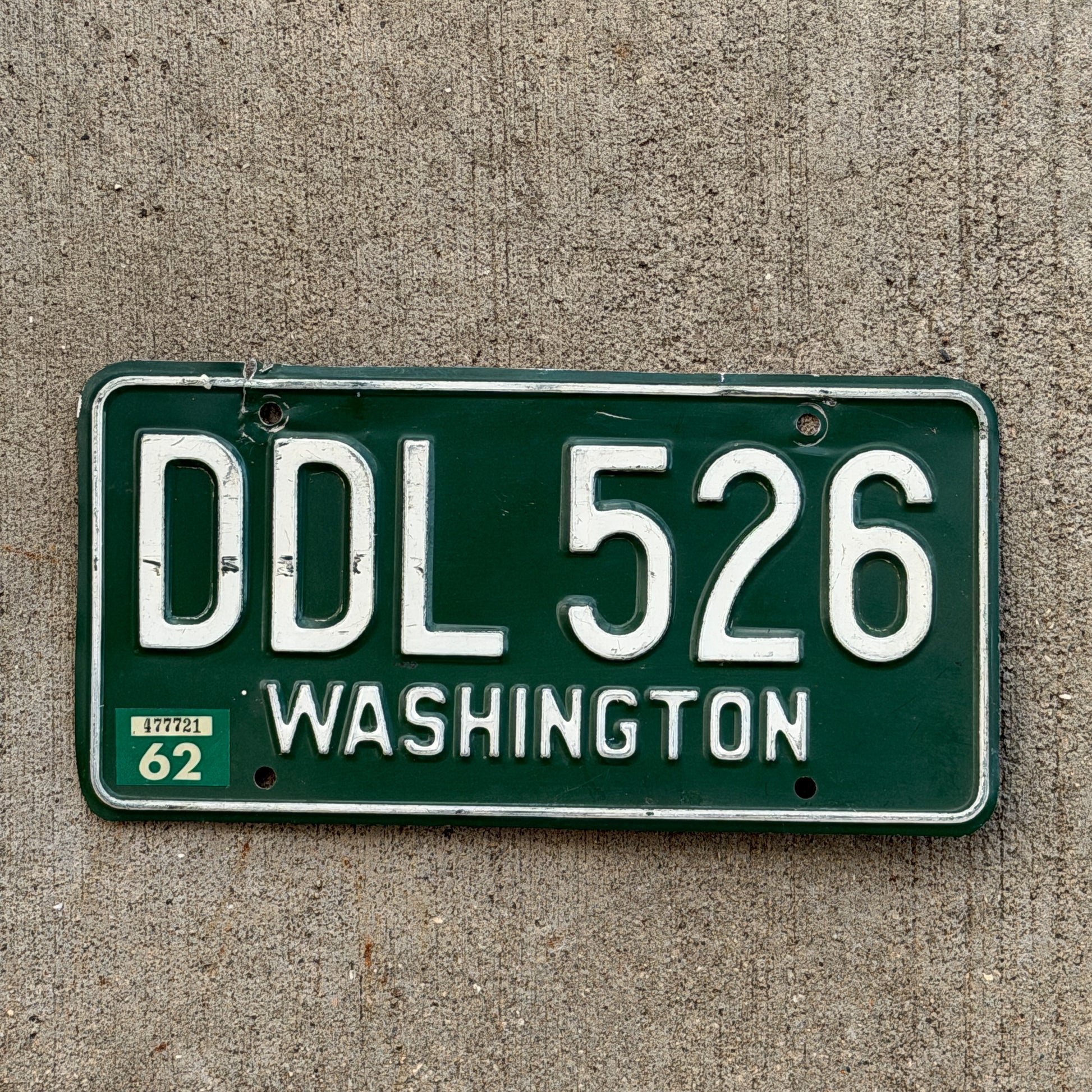 Photo of a 1958 1962 Washington License Plate Auto Tag Garage Decor Vintage DDL 526 with original patina