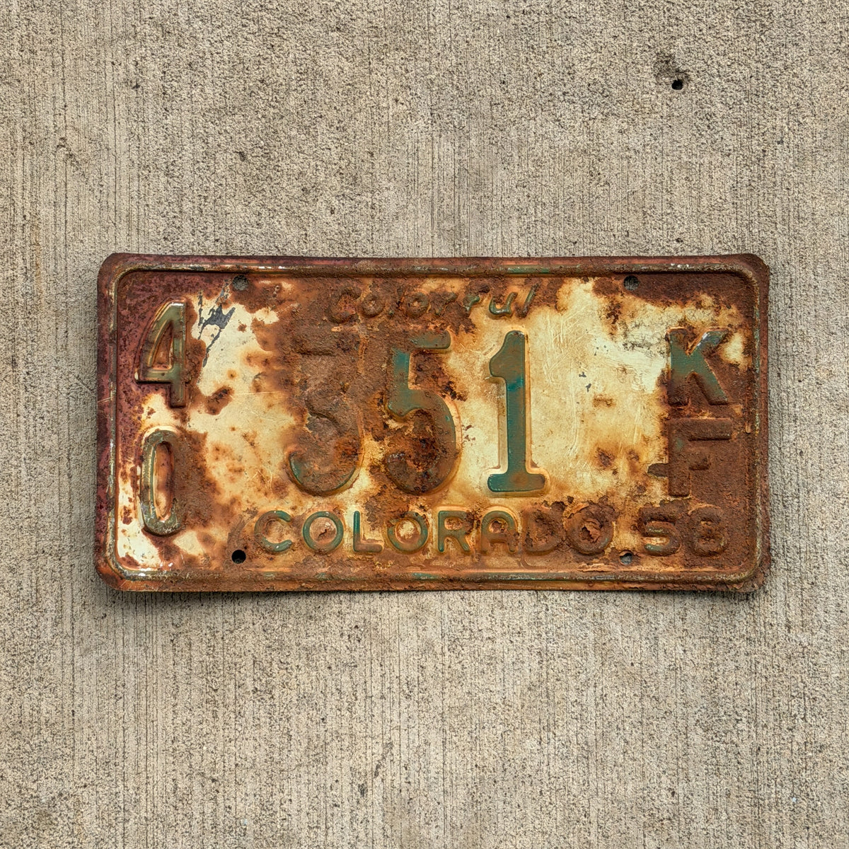 Photo of a 1958 Colorado Farm Truck License Plate Auto Tag Garage Decor Vintage 40 351 KF with original patina