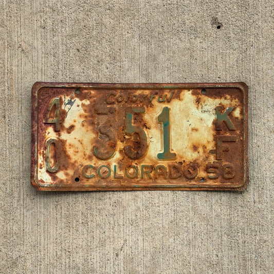Photo of a 1958 Colorado Farm Truck License Plate Auto Tag Garage Decor Vintage 40 351 KF with original patina