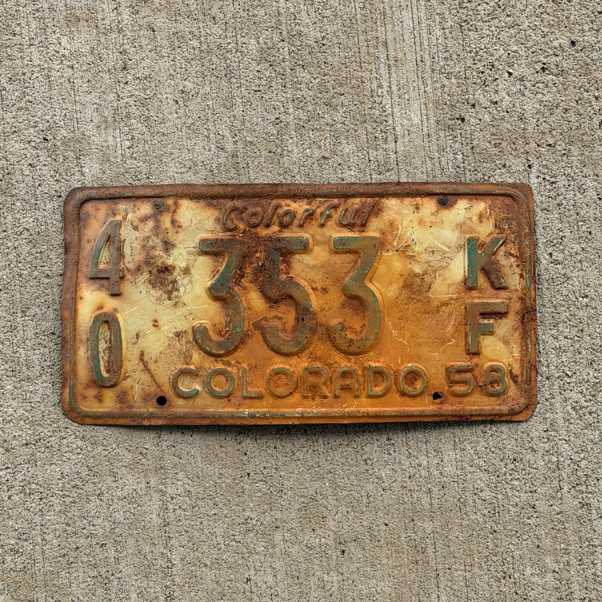 Photo of a 1958 Colorado Farm Truck License Plate Auto Tag Garage Decor Vintage 40 353 KF with original patina