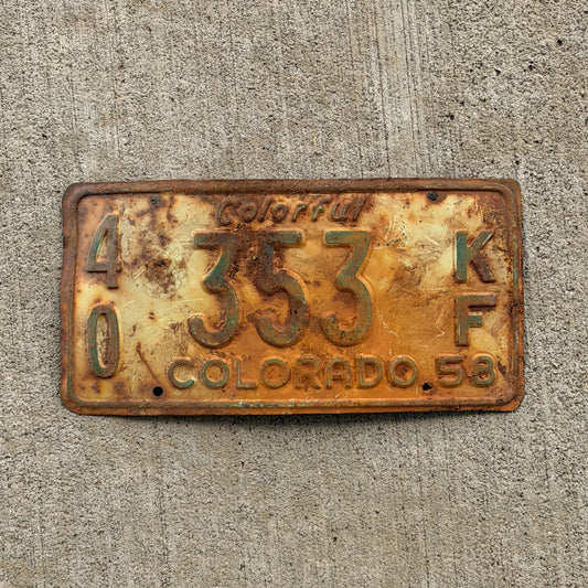 Photo of a 1958 Colorado Farm Truck License Plate Auto Tag Garage Decor Vintage 40 353 KF with original patina