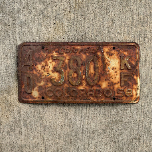 Photo of a 1958 Colorado Farm Truck License Plate Auto Tag Garage Decor Vintage 40 380 KF with original patina