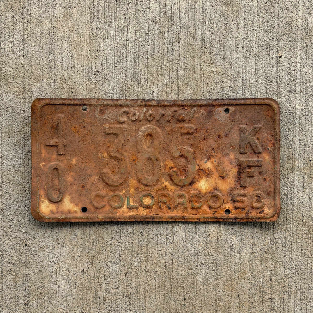 Photo of a 1958 Colorado Farm Truck License Plate Auto Tag Garage Decor Vintage 40 385 KF with original patina