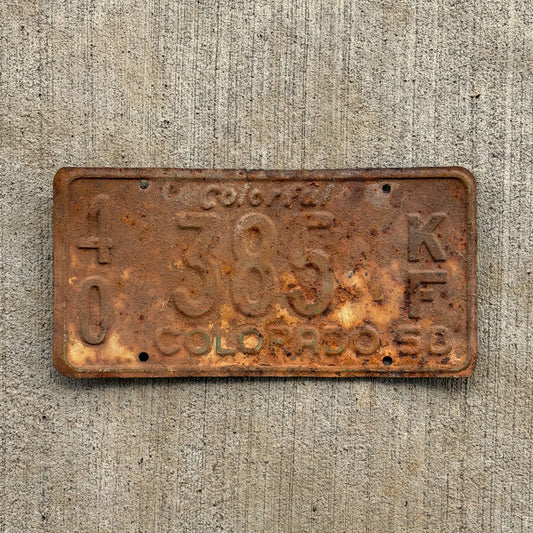 Photo of a 1958 Colorado Farm Truck License Plate Auto Tag Garage Decor Vintage 40 385 KF with original patina
