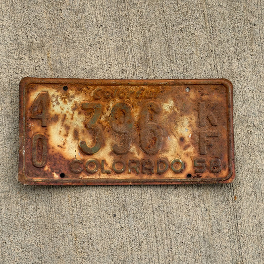 Photo of a 1958 Colorado Farm Truck License Plate Auto Tag Garage Decor Vintage 40 396 KF with original patina