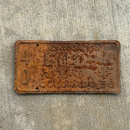 Photo of a 1958 Colorado Farm Truck License Plate Auto Tag Garage Decor Vintage 40 509 KF with original patina