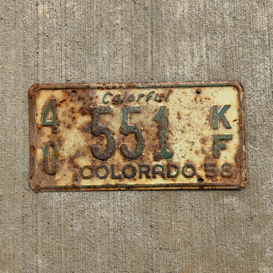 Photo of a 1958 Colorado Farm Truck License Plate Auto Tag Garage Decor Vintage 40 551 KF with original patina